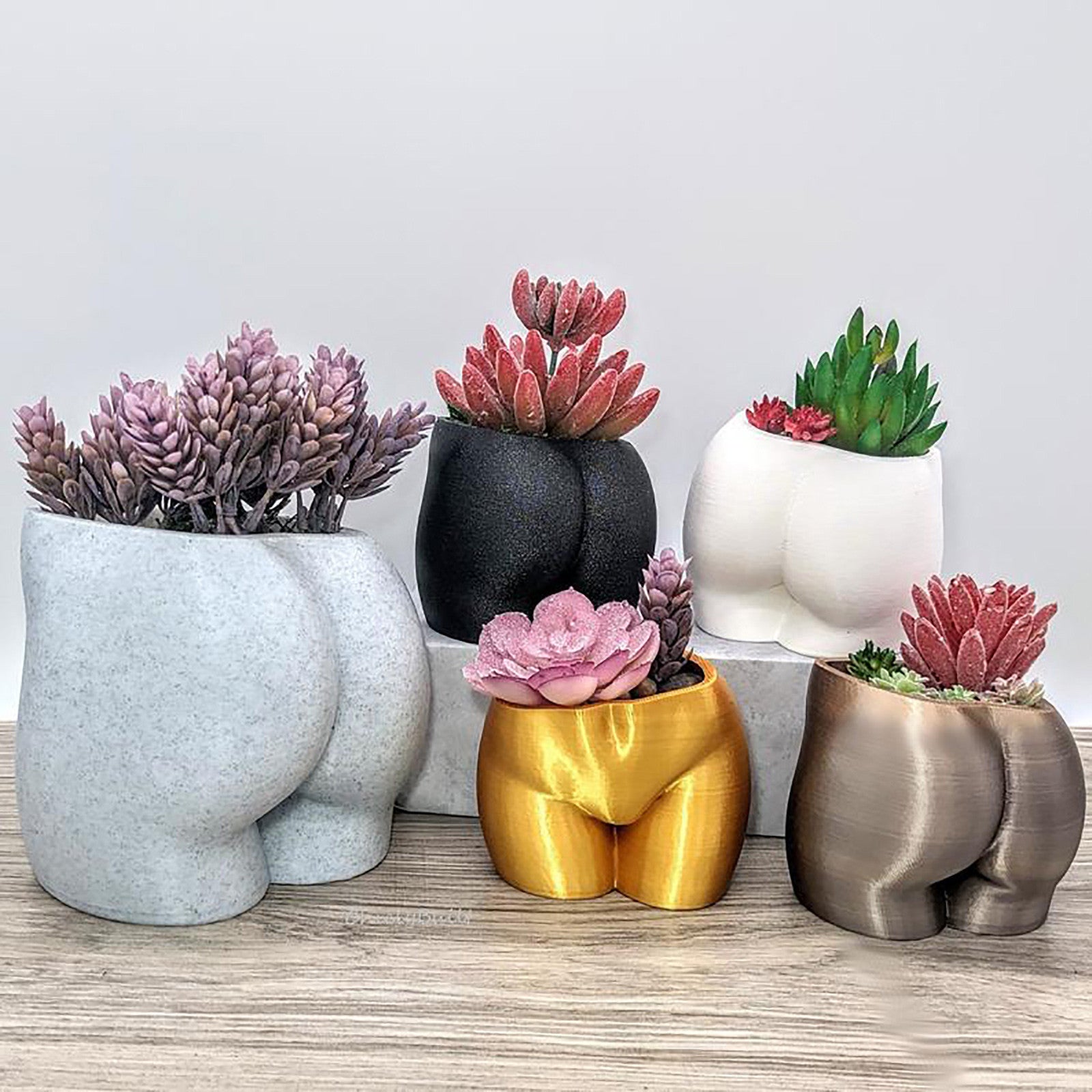 colourful ceramic plant pots Bright Bloom Colourful Bum Plant Pots