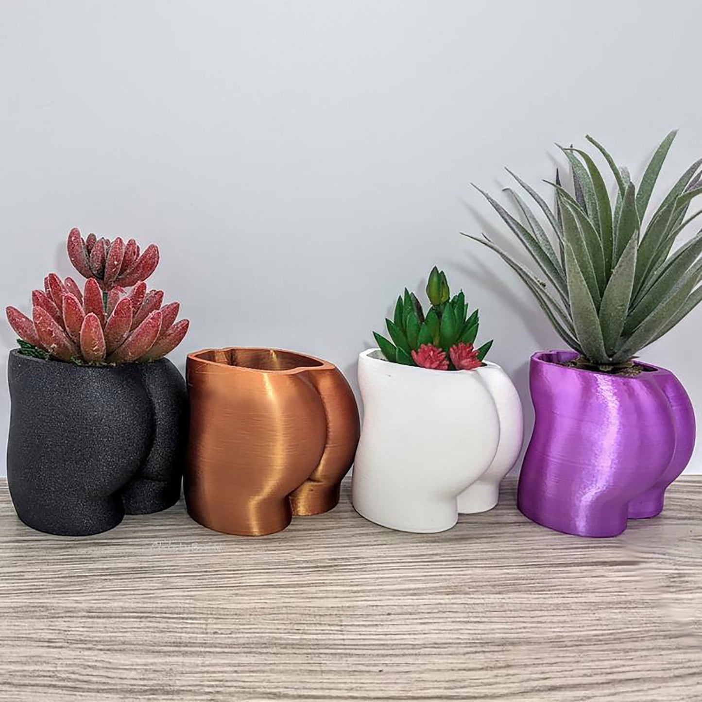 bright coloured plant pots Bright Bloom Colourful Bum Plant Pots – Decorum Design Co