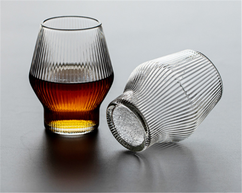 Artisanal Ripple: Textured Glass Tumbler