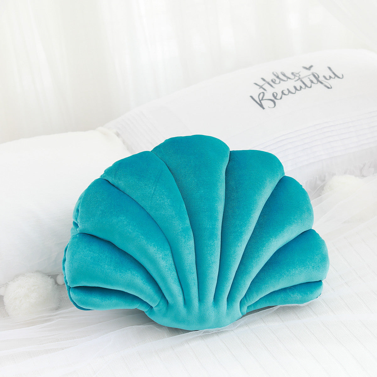 Ocean Bloom: Vibrant Shell-Shaped Cushions