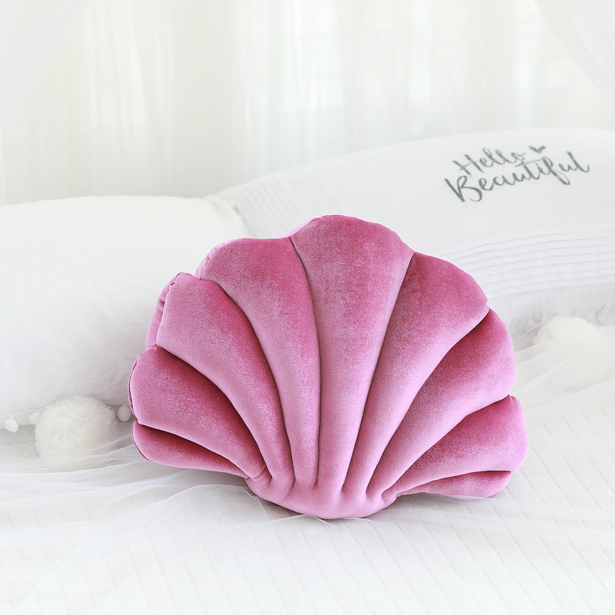 Ocean Bloom: Vibrant Shell-Shaped Cushions