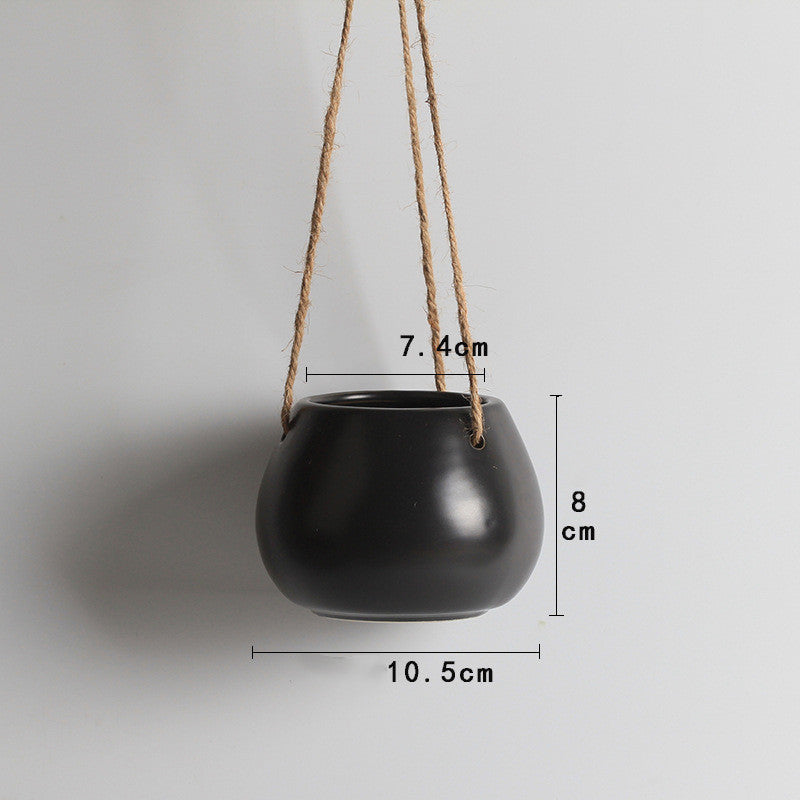 black ceramic hanging planter Hanging Haven Plant Pot – Decorum Design Co