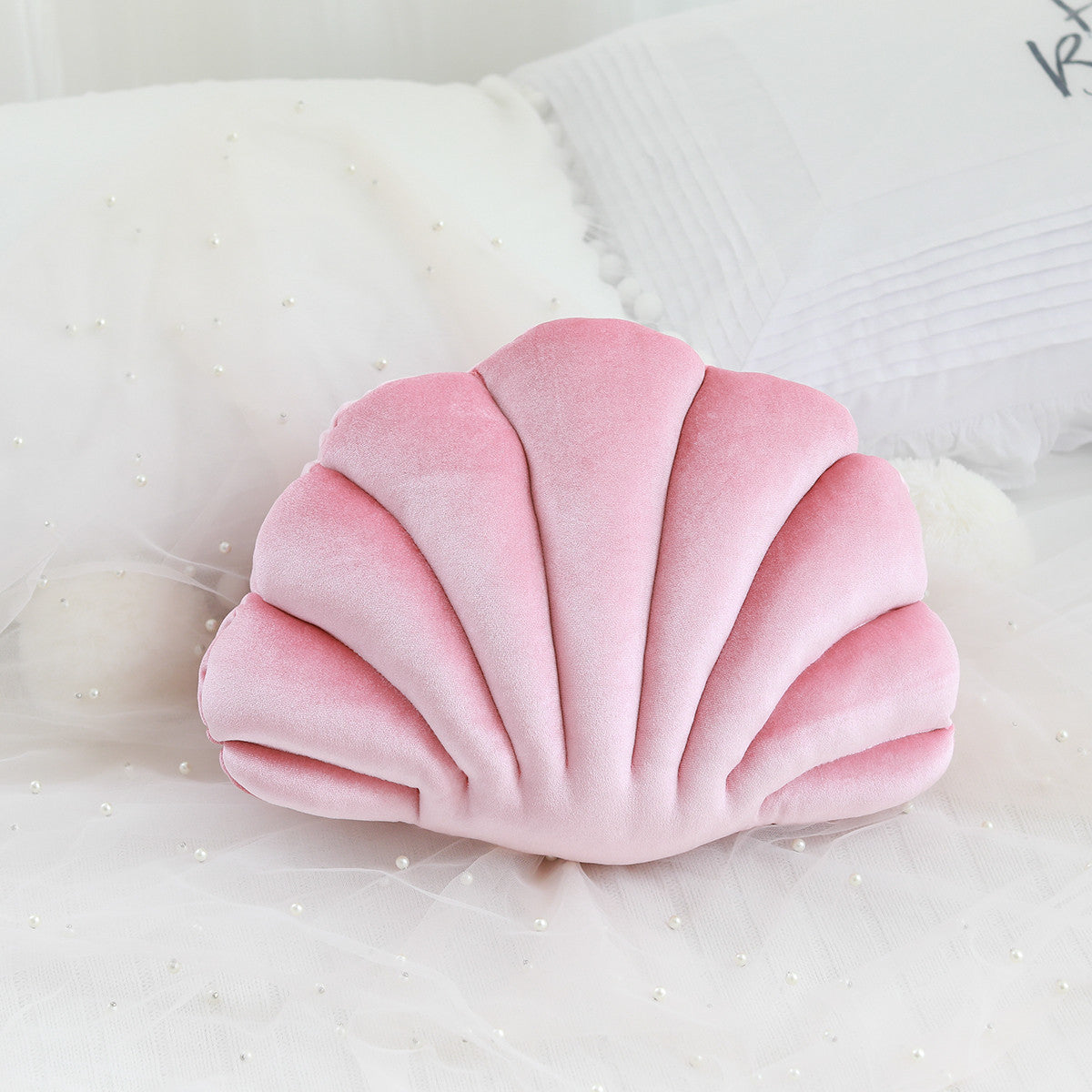 Ocean Bloom: Vibrant Shell-Shaped Cushions