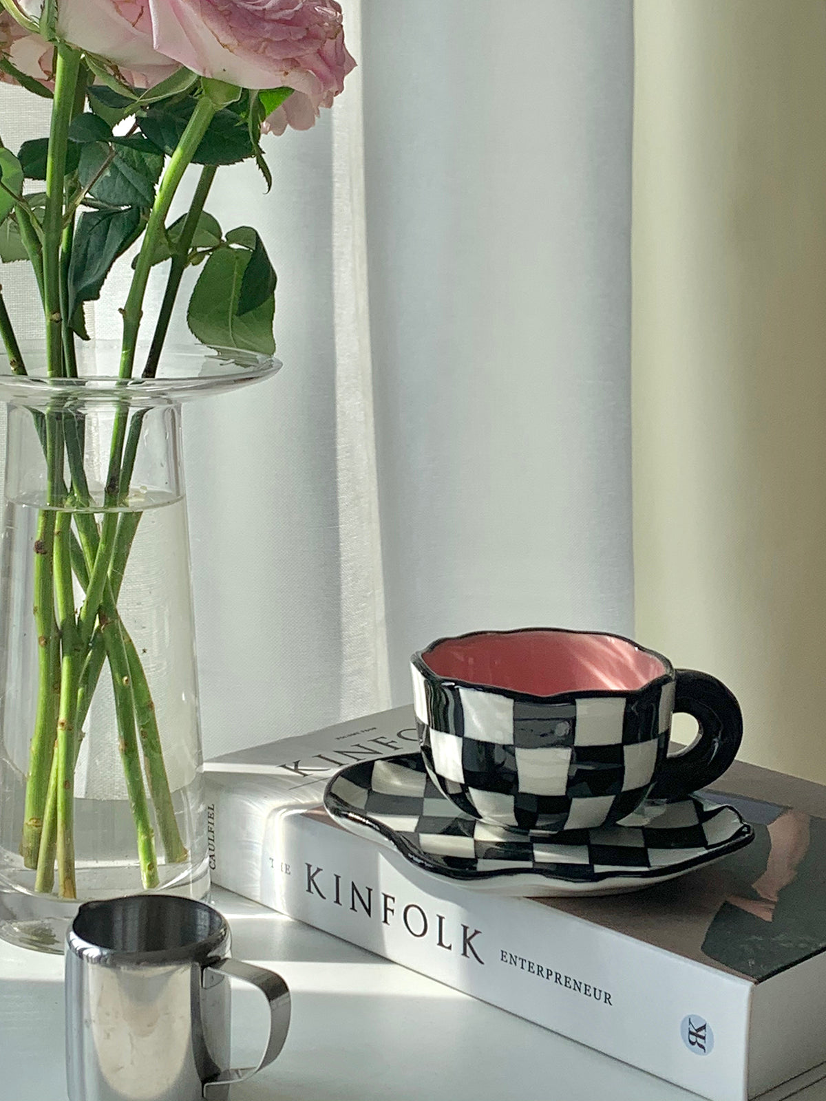 Checkerboard Charm: Black and White Mug & Saucer