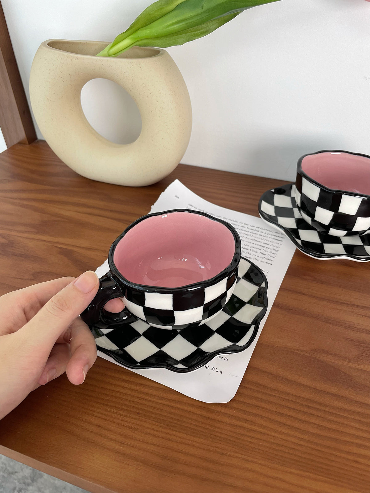 Checkerboard Charm: Black and White Mug & Saucer