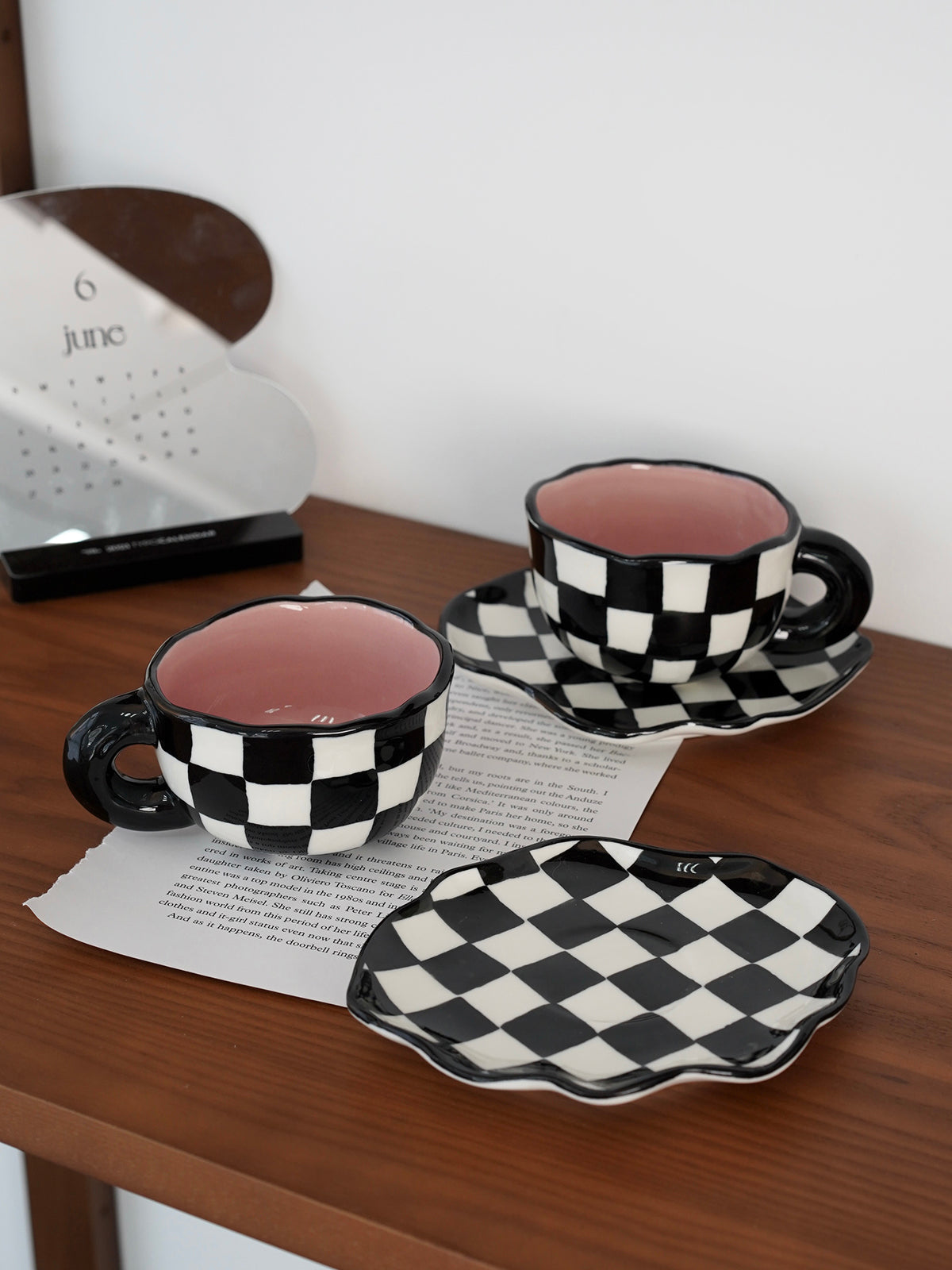 Checkerboard Charm: Black and White Mug & Saucer